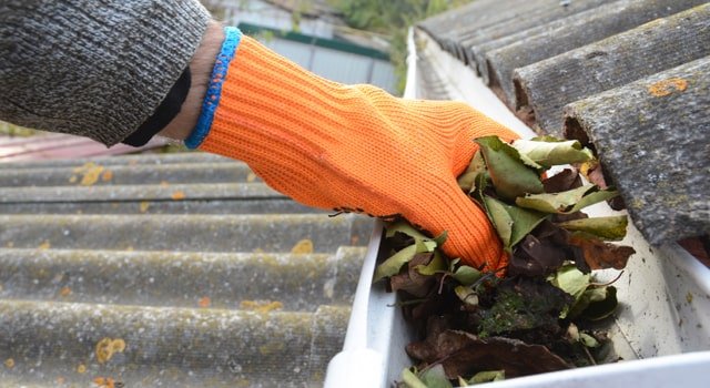 cleaning a gutter