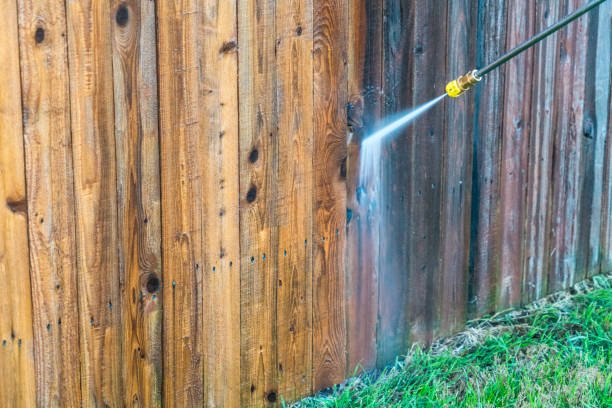 pressure cleaning a fence